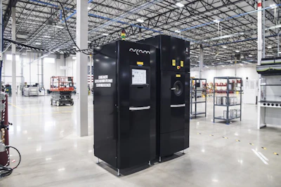 An Arcam electron-beam 3D printer. GE Aviation is already using these machines to print turbine blades for the GE9X, the world’s largest jet engine. (Image credit: Mark Trent for GE Reports)