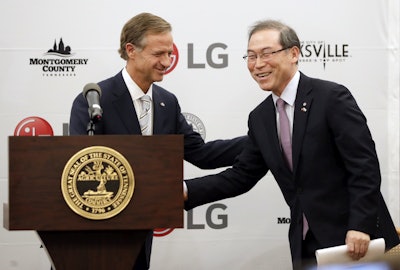 Tennessee Gov. Bill Haslam, left, introduces Dan Song, the president of LG's home appliances division, during an announcement Tuesday, Feb. 28, 2017, in Nashville, Tenn. It was announced that South Korean appliance maker LG Electronics Inc. has selected Clarksville, Tenn., as the site for its washing machine plant in the United States. The 829,000-square-foot facility is projected to cost $250 million and create 600 new jobs. (Image credit: Mark Humphrey/ AP Photo)