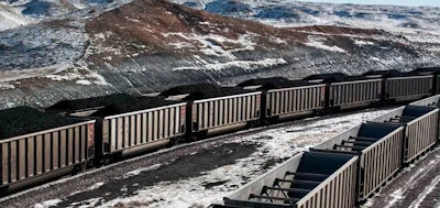 Rail cars are filled with coal and sprayed with a topper agent at Cloud Peak Energy's Antelope Mine in Wyoming/ (Ryan Dorgan / Casper Star-Tribune via AP, File)