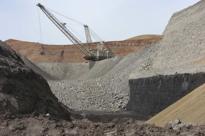 In this April 4, 2013, file photo, a dragline excavator moves rocks above a coal seam at the Spring Creek Mine in Decker, Mont. President Trump's latest move to support coal mining is unlikely to turn around the industry's prospects immediately. Experts say the biggest problem faced by the mining industry today isn't a coal shortage of coal or even the prospect of climate change regulations, but an abundance of cheap natural gas. (AP Photo/Matthew Brown, File)