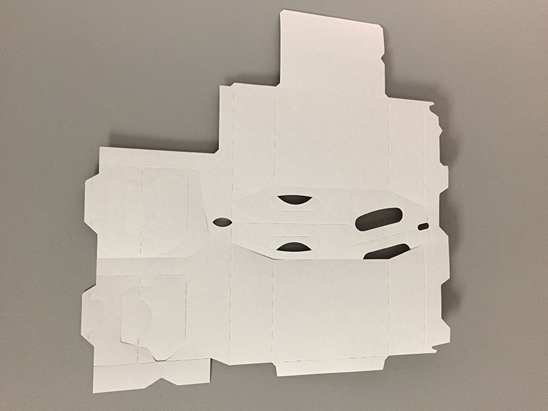 Difficult to manufacture carton profiles: An unfolded six-pack beer basket.