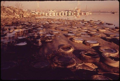 Trash and old tires litter the shores at the Middle Branch of Baltimore Harbor in Maryland in 1973. Photo: Jim Pickerell, NARA