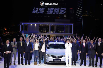 Movie star Jackie Chan in white attends the global launch of the Buick Velite 5, an extended range electric hybrid ahead of the Shanghai Auto 2017 show in Shanghai, China, Tuesday, April 18, 2017. At the auto show, the global industry's biggest marketing event of the year, almost every global and Chinese auto brand is showing at least one electric concept vehicle, if not a market-ready model. (AP Photo/Ng Han Guan)