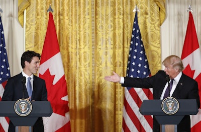 President Donald Trump and Canadian Prime Minister Justin Trudeau participate in a joint news conference. (AP Photo)