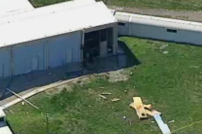This photo from video by KCTV5 shows damage to the side of a building in the aftermath of a fatal explosion at the Lake City Army Ammunition Plant in Independence, Mo., Tuesday, April 11, 2017. (KCTV5 via AP)