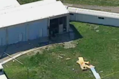 This photo from video by KCTV5 shows damage to the side of a building in the aftermath of a fatal explosion at the Lake City Army Ammunition Plant in Independence, Mo., Tuesday, April 11, 2017. (KCTV5 via AP)