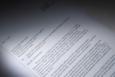 This letter obtained by the Associated Press and photographed in the news agency's Washington bureau, Wednesday, April 19, 2017, was sent to EPA Administrator Scott Pruitt by attorneys representing Dow Chemical requesting the EPA 'to set aside' the results of government studies they claimed were fundamentally flawed. Dow Chemical CEO Andrew Liveris is a close adviser to President Donald Trump. The company gave $1 million for Trump’s inaugural activities. (AP Photo)