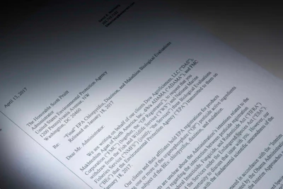 This letter obtained by the Associated Press and photographed in the news agency's Washington bureau, Wednesday, April 19, 2017, was sent to EPA Administrator Scott Pruitt by attorneys representing Dow Chemical requesting the EPA 'to set aside' the results of government studies they claimed were fundamentally flawed. Dow Chemical CEO Andrew Liveris is a close adviser to President Donald Trump. The company gave $1 million for Trump’s inaugural activities. (AP Photo)