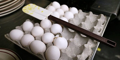 In this June 19, 2015 file photo, eggs sit waiting to be cooked at a cafe in Des Moines, Iowa. The U.S. government's latest report card released Thursday, April 20, 2017, on food poisoning suggests that campylobacter, a germ commonly linked to raw milk and poultry, is surpassing salmonella at the top of the culprit list. The report counts cases in only 10 states for nine of the most common causes of foodborne illness, but is believed to be a good indicator of national food poisoning trends. (AP Photo/Charlie Neibergall, File)