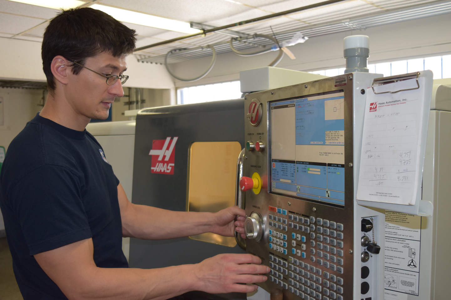 Brian Riley, United States Marine Corps Veteran, works on a Haas Automation, Inc. CNC Lathe as part of the Workshops for Warriors 16-week machining program, earning him nationally recognized credentials from the National Institute for Metalworking Skills. (WFW photo)