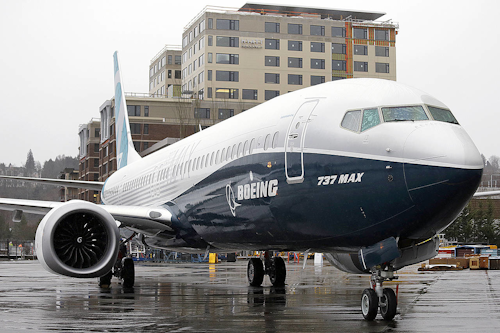 In this March 7, 2017, file photo, the first of the large Boeing 737 MAX 9 models, Boeing's newest commercial airplane, sits outside its production plant in Renton, Wash. Boeing stops test flights of its new 737 model because of a possible problem in engine discs. The company is working with engine maker CFM to investigate. The company said Wednesday, May 10, 2017, it was notified of a potential manufacturing-quality issue by CFM, which makes the engines that are going on the Boeing 737 Max. (AP Photo/Elaine Thompson, File)