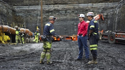 Corsa CEO George Dethlefsen speaks to workers at a new Corsa coal mine in Friedens, Pa., Wednesday, June 7, 2017. Corsa Coal Corp. says the mine will create 70 to 100 new jobs and produce some 400,000 tons of metallurgical coal a year. President Donald Trump referred to the mine's opening during a speech announcing his intent to withdraw from the Paris climate accords. (AP Photo/Dake Kang)