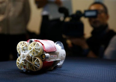 Newly developed robot mockup for underwater investigation for a Fukushima's damaged reactor, is displayed at a Toshiba Corp. test facility in Yokosuka near Tokyo Thursday, June 15, 2017. (Shuji Kajiyama, AP Photo)
