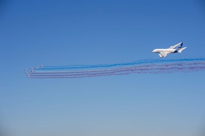 An Airbus A380 and the Patrouille de France aerobatic demonstration team putting on a show at the 2017 Paris Air Show(Credit: Airbus)