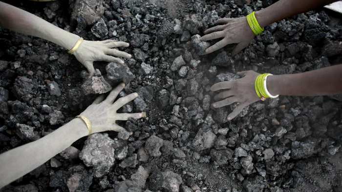In this Monday, Dec. 14, 2015, file photo, Indian women use bare hands to pick reusable pieces from heaps of used coal discarded by a carbon factory in Gauhati, India. The world’s biggest coal users - China, the United States and India - have boosted coal mining in 2017, in an abrupt departure from last year’s record global decline for the heavily polluting fuel and a setback to efforts to rein in climate change emissions. (AP Photo/ Anupam Nath, File)