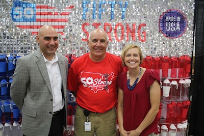 Walmart Regional General Manager Jason Leisenring, Randy Carter, Chairman, 50 Strong and Ashley Thompson, CEO, 50 Strong at 50 Strong’s factory in Lima, OH celebrate their shared commitment to U.S. manufacturing and Made in America products. Walmart selected 50 Strong to manufacture five million water bottles, which had previously been made by a Chinese competitor.