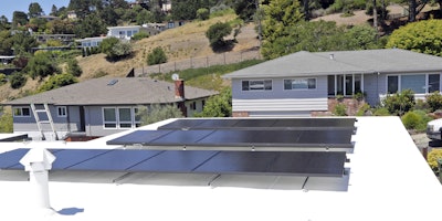 This undated product image provided by Solaria Corp. shows a home with solar panels installed. Small business owners who install solar panels or help customers use clean energy don’t seem fazed by President Donald Trump’s plan to withdraw the U.S. from the Paris climate accord, saying they expect demand for their services will still keep growing. “It’s an economic decision people are making, although it also makes environmental sense,” says Suvi Sharma, CEO of Solaria, a Fremont, Calif.-based company that designs and sells solar energy panel systems. (Ed Matney/Solaria Corp. via AP)