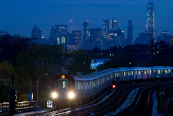 A No. 7 subway train rides the rails in the Queens borough of New York, with the Manhattan skyline in the background. On Monday, July 17, 2017, the Federal Reserve of New York releases its July survey of manufacturers in the state. (AP Photo/Mark Lennihan, File)