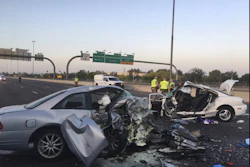 This Friday, April 14, 2017, file photo provided by the Arizona Department of Public Safety shows the mangled remains of cars involved in a fatal accident on the Northbound Interstate 17 in Phoenix, Ariz. Arizona transportation officials are moving forward with a first-in-the-nation pilot program that will use thermal camera technology to curb the wrong-way driving problem plaguing the state. The wrong-way detection system will illuminate a sign that notifies the wrong-way driver, and immediately alert the state Department of Public Safety. Arizona Department of Transportation officials will update message boards along the interstate that cautions other drivers of the wrong-way vehicle. (Arizona Department of Public Safety via AP)