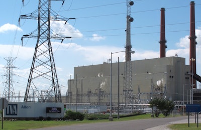 The Tennessee Valley Authority's coal-burning Allen Fossil Plant on Friday, July 14, 2017 in Memphis, Tenn. Groundwater in wells at the plant have tested for excessive levels of arsenic and lead. (AP Photo/Adrian Sainz)