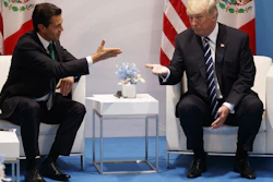 President Donald Trump meets with Mexican President Enrique Pena Nieto at the G20 Summit, Friday, July 7, 2017, in Hamburg. (AP Photo/Evan Vucci)
