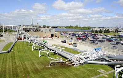 This photo provided by the Wayne Township Fire Department shows a network of large pipes and support structures that collapsed at a Rolls-Royce aircraft-engine assembly plant in Indianapolis, Friday, Aug. 4, 2017. A Rolls Royce spokesman said there were no injuries. (Michael D. Pruitt/Wayne Township Fire Department via AP)