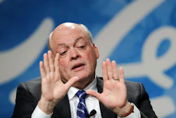 Ford Motor Co. CEO Jim Hackett speaks after being introduced as the automaker's new chief executive in Dearborn, Mich. Hackett says the company isn’t taking its eyes off the present as it prepares for transportation in the future. (AP Photo/Paul Sancya, File)