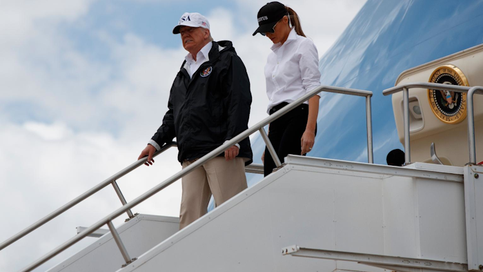 President Donald Trump and first lady Melania Trump arrive on Air Force One at Austin-Bergstrom International Airport in Austin, Texas, Tuesday, Aug. 29, 2017, wldfor briefings on Harvey relief efforts. (AP Photo/Evan Vucci)