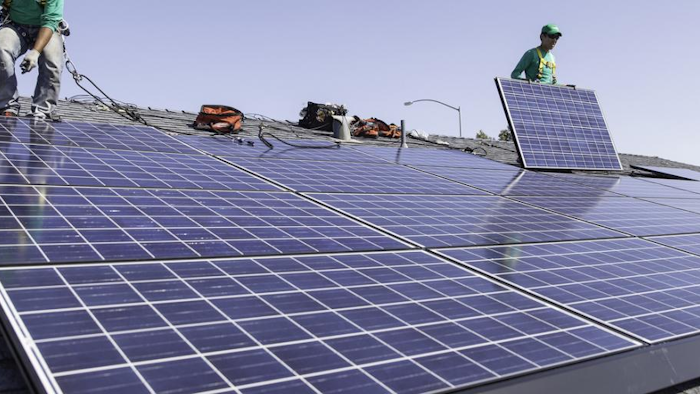 Mnet 108604 Tesla Solarcity Deal Ap Photo