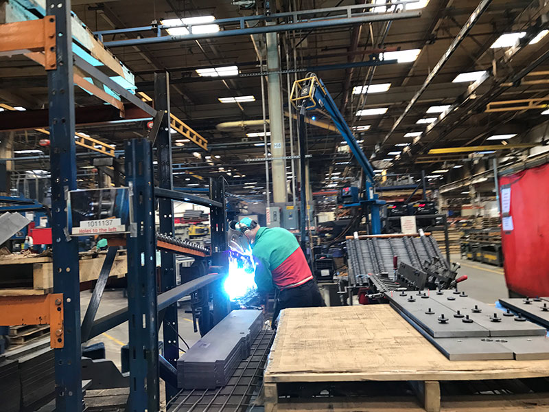 A worker welds at the Raymond Corporation manufacturing facility in Greene, NY. (IMPO photo)