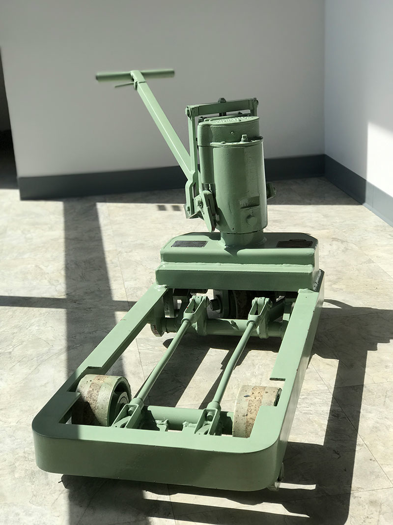 A restored hydraulic hand pallet truck now sits in front of the new RayBuilt Center of Excellence. (IMPO Photo)