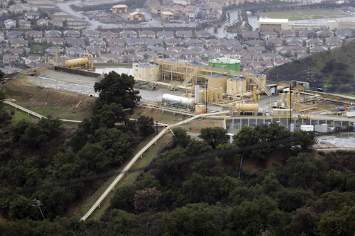 This Jan. 12, 2017 file photo shows gas gathering plant on a hilltop at the Southern California Gas Company's Aliso Canyon storage facility near the Porter Ranch neighborhood of Los Angeles. (AP Photo/Jae C. Hong, File)