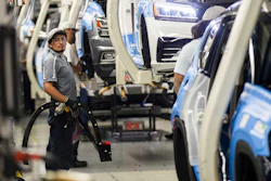 Workers produce vehicles at Volkswagen's lone U.S. plant in Chattanooga, Tenn. U.S. industrial output plunged 0.9 percent in August, the most in eight years, mostly because of Hurricane Harvey's damage to the oil refining, plastics and chemicals industries. (AP Photo/Erik Schelzig, File)