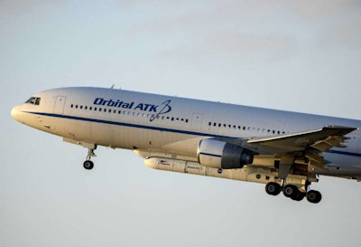 The Orbital ATK L-1011 aircraft lifts off from Cape Canaveral Air Force Station, Fla. Northrop Grumman is buying aerospace and defense technology company Orbital ATK for about $7.8 billion as activity in the sector heats up along with global tensions, announced Monday, Sept. 18, 2017. (Craig Bailey/Florida Today via AP)