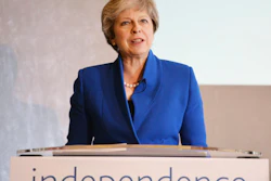 Britain's Prime Minister Theresa May speaking during the Bank of England 'Independence 20 years on' conference, which marks two decades of operational independence from the UK government, at Fishmongers Hall in London Thursday Sept. 28, 2017. May on Thursday lambasted the behavior of Boeing after it complained that Canadian rival Bombardier used unfair government subsidies to sell planes at artificially low prices. (John Stillwell/PA via AP)