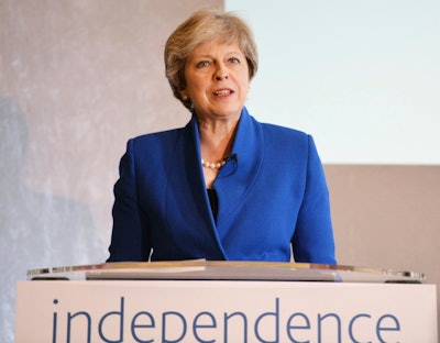 Britain's Prime Minister Theresa May speaking during the Bank of England 'Independence 20 years on' conference, which marks two decades of operational independence from the UK government, at Fishmongers Hall in London Thursday Sept. 28, 2017. May on Thursday lambasted the behavior of Boeing after it complained that Canadian rival Bombardier used unfair government subsidies to sell planes at artificially low prices. (John Stillwell/PA via AP)