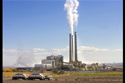 In this Oct. 23, 2009, file photo, coal trucks leave the coal-fired Hunter Power Plant just south of Castle Dale, Utah, after making a delivery. (AP photo)