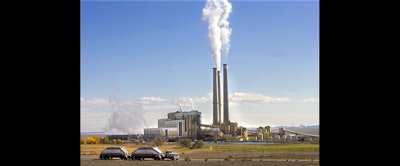 In this Oct. 23, 2009, file photo, coal trucks leave the coal-fired Hunter Power Plant just south of Castle Dale, Utah, after making a delivery. (AP photo)