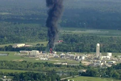 Smoke rises from the Arkema chemical plant in Crosby, Tex., on Friday. (Image credit: KTRK via Associated Press)