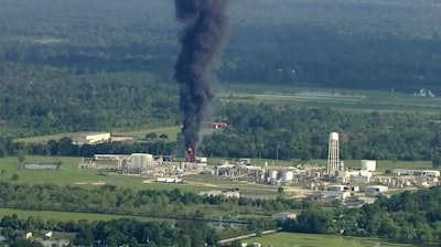 Smoke rises from the Arkema chemical plant in Crosby, Tex., on Friday. (Image credit: KTRK via Associated Press)