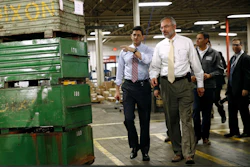 Speaker of the House Paul Ryan, R-Wis., left, and Rep. Andy Harris, R-Md., right, approach a stage before holding a tax reform town hall with employees at the Dixon Valve & Coupling Company factory in Chestertown, Md., Thursday, Oct. 5, 2017. (AP Photo/Patrick Semansky)