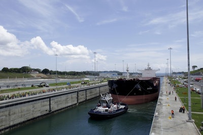 A Malta flagged cargo ship named Baroque navigates the Agua Clara locks as the first test of the newly expanded Panama Canal, in Agua Clara, Panama. (Arnulfo Franco/AP Photo)