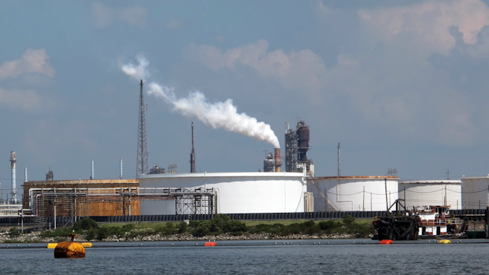 On Tuesday, Oct. 31, 2017, federal officials said that Exxon Mobil settled violations of the clean-air law with the Trump administration by agreeing to pay a $2.5 million civil penalty and spend $300 million on pollution-control technology at plants along the Gulf Coast. The plants are in Baytown, Beaumont and Mont Belvieu, Texas, and Baton Rouge, Louisiana. As part of the settlement, Exxon will spend $1 million to plant trees in Baytown. (AP Photo/Frank Bajak)