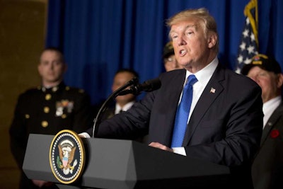 U.S. President Donald Trump speaks at event to sign a proclamation honoring veterans at the Hyatt Regency Danang Resort in Danang, Vietnam, Friday, Nov. 10, 2017. Trump is in Vietnam to attend the Asia-Pacific Economic Cooperation (APEC) Summit. (AP Photo/Mark Schiefelbein)