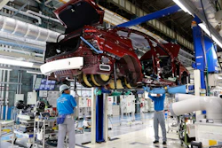 Workers of Toyota Motor Corp. assemble a Mirai fuel cell vehicle at the automaker's Motomachi plant in Toyota, western Japan. Toyota is banking on a futuristic “electrification” auto technology called hydrogen fuel cells for its zero-emissions option. The Associated Press got a tour of Toyota’s Motomachi plant that assembles the Mirai fuel cell vehicle. Toyota believes the drawbacks of batteries make electric vehicles suited more for short urban commutes, with hydrogen being the more practical energy choice of the future, in the long run. (AP Photo/Yuri Kageyama)