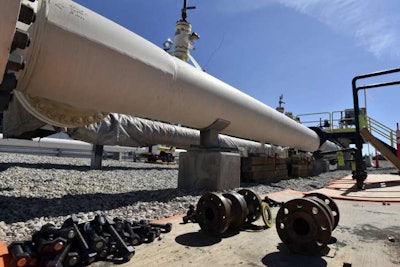 Fresh nuts, bolts and fittings are ready to be added to the east leg of the pipeline near St. Ignace, Mich., as Canadian oil transport company Enbridge prepares to test the east and west sides of the Line 5 pipeline under the Straits of Mackinac. (Dale G Young/The Detroit News via AP)