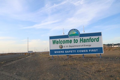 A sign welcomes drivers to Hanford Nuclear Reservation in Richland, Wash. After almost two decades of work, the government has nearly finished removing radioactive wastes from a first group of underground storage tanks in eastern Washington. (AP Photo/Manuel Valdes, file)