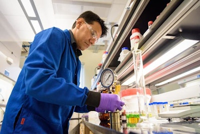 In renewable jet fuel research at the University of Delaware, Saikat Dutta, postdoctoral researcher at the Catalysis Center for Energy Innovation, conducts experiments with catalysts, the chemical 'goats' that kickstart chemical reactions. Evan Krape/University of Delaware)