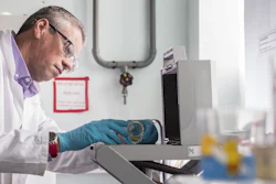 Dr Andrew Turner analyses an item of glassware using portable x-ray fluorescence (XRF) spectrometry. (Lloyd Russell/University of Plymouth)