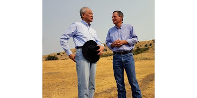 In this Sept. 8, 2017 photo, Chinese ambassador to the United States Cui Tiankai, left, speaks with Republican Montana Sen. Steve Daines about ways to expand the Chinese market for Montana beef. The two met with other Chinese and Montana agriculture officials during a tour of a ranch in the Bozeman area. China's largest online retailer has signed a deal with the Montana Stockgrowers Association to buy $200 million worth of Montana beef over the next three years and to build a $100 million slaughterhouse in the state. (Tom Lutey Gazette Staff/The Billings Gazette via AP)